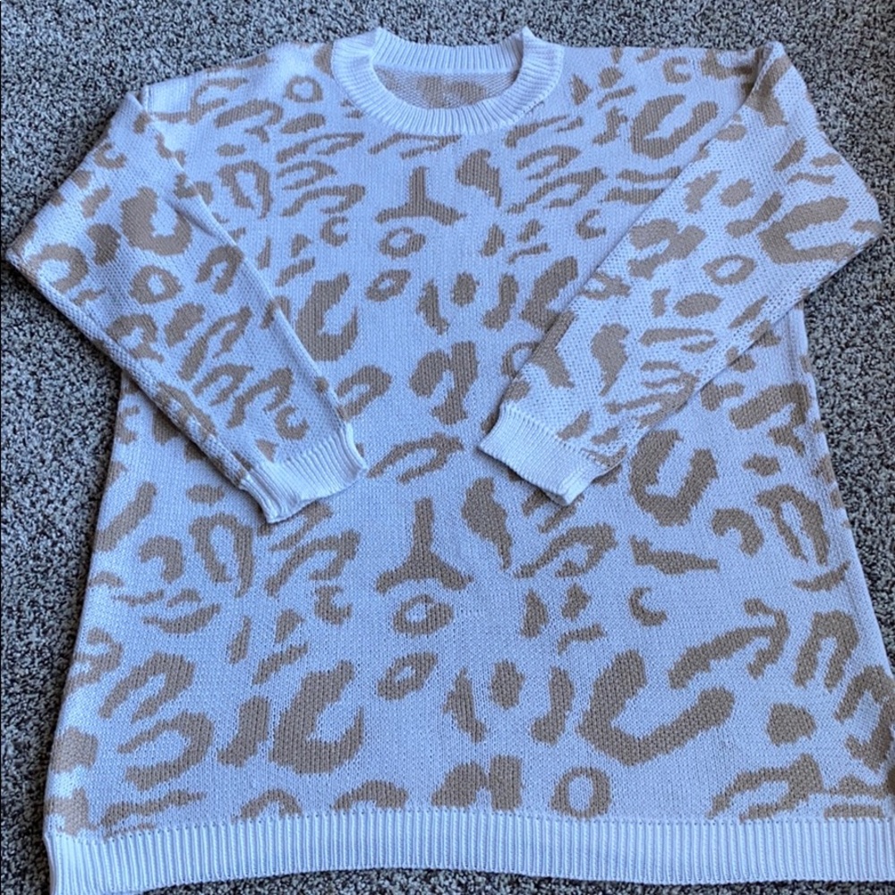 White leopard tunic sweater size small.